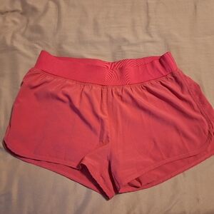 Zyia coral running short